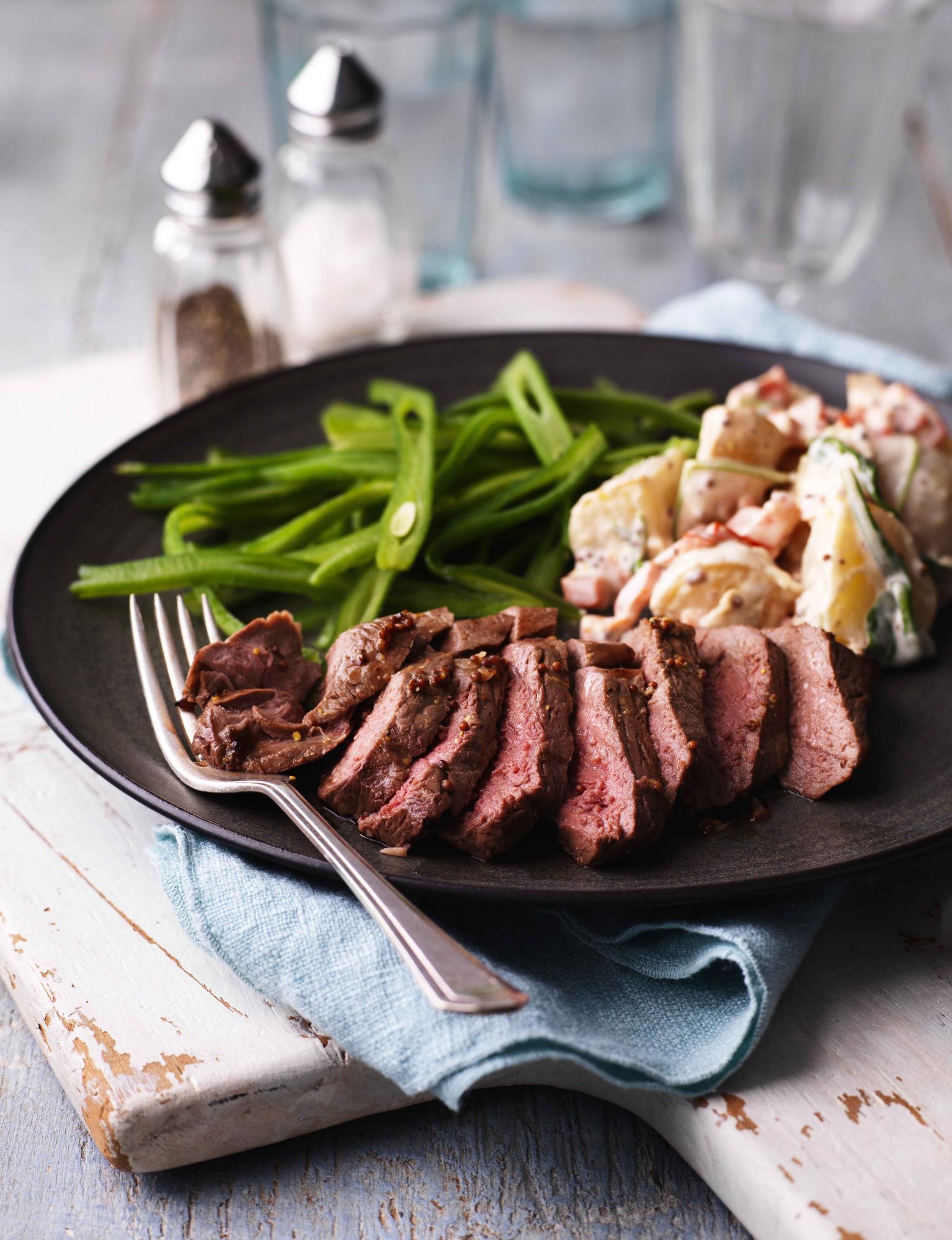 Garlic and mustard marinated steaks